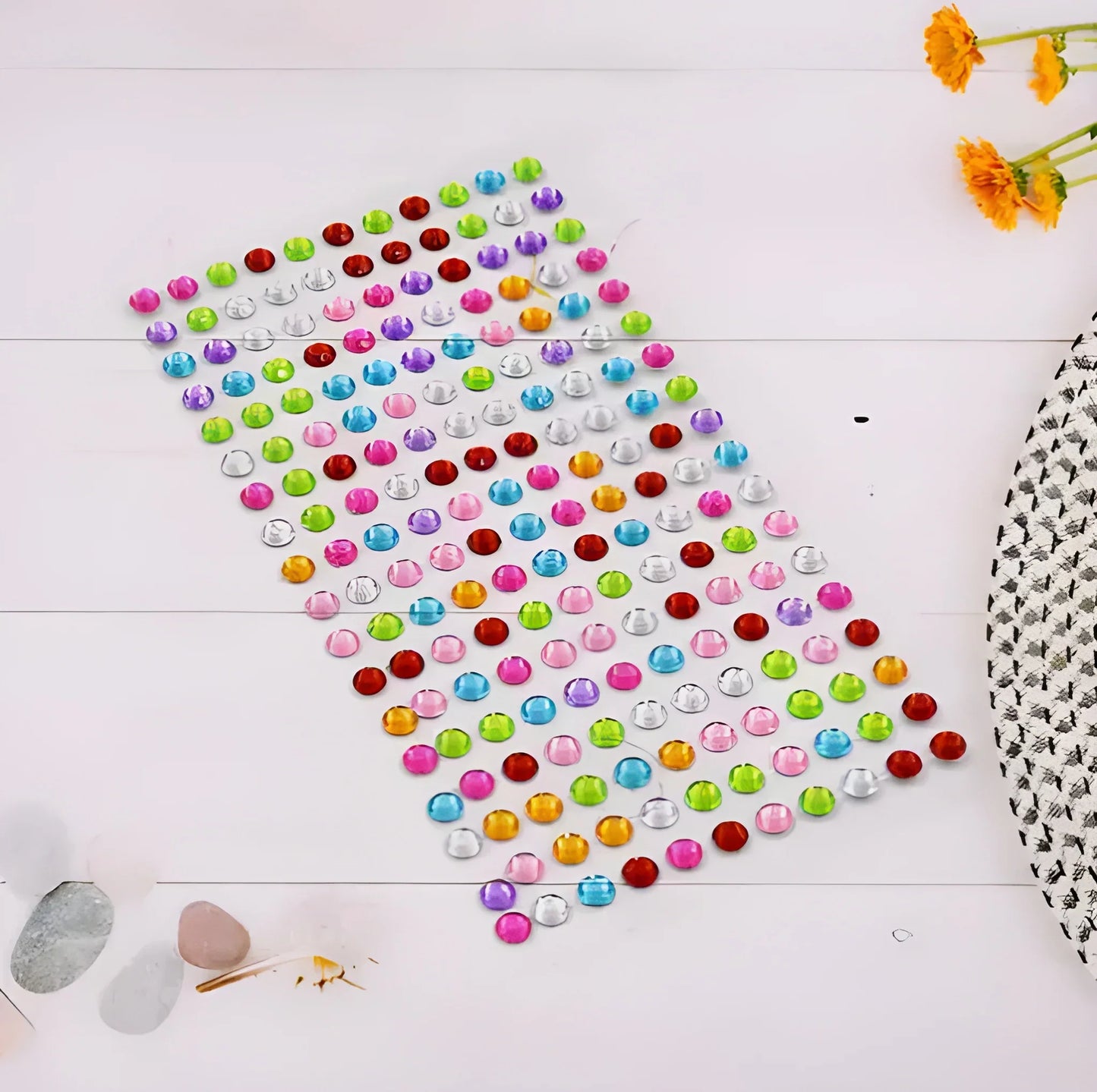 Crystal sticker sheet with multicolor round gem dots and a silver backing