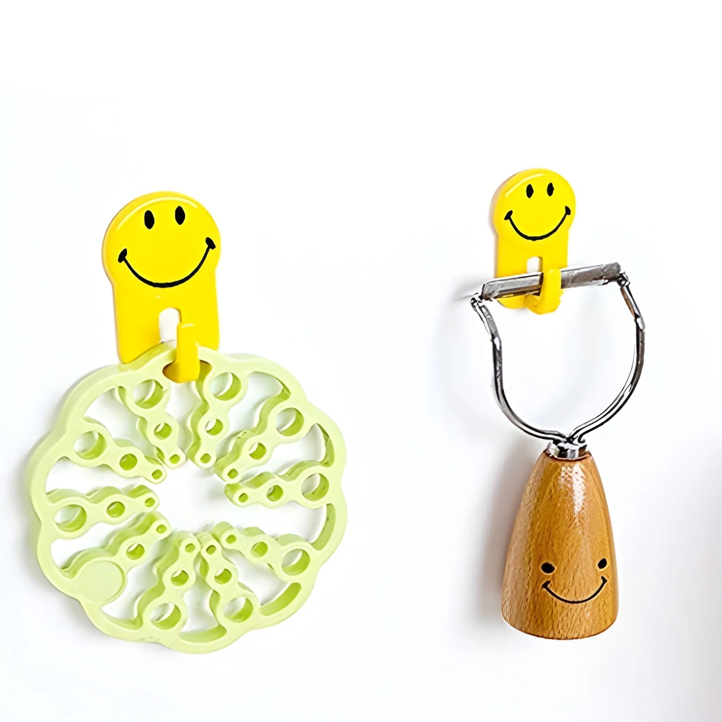 Smiley face adhesive hooks set with green spiral base and metal clip with wooden hook