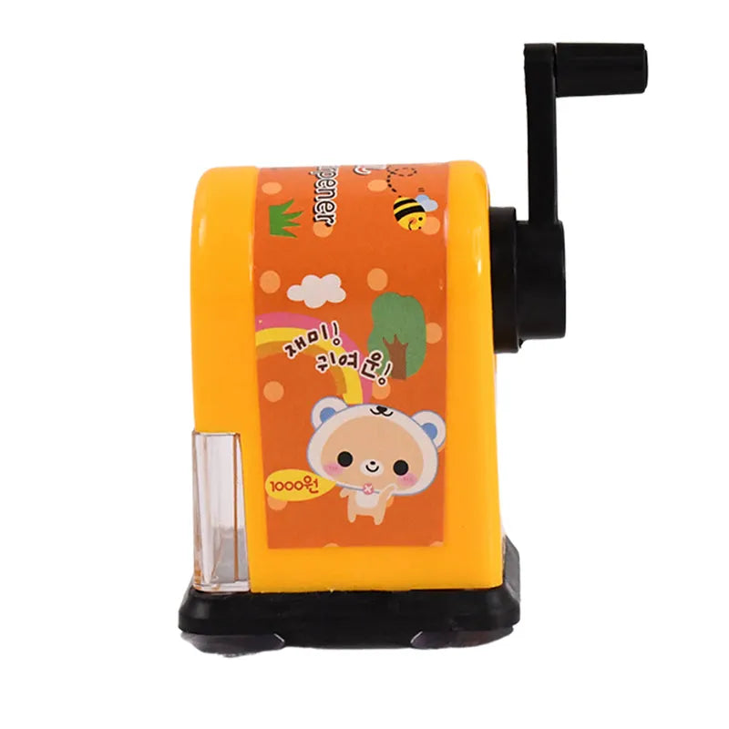 Tabletop pencil sharpener with orange cartoon front and clear shavings container