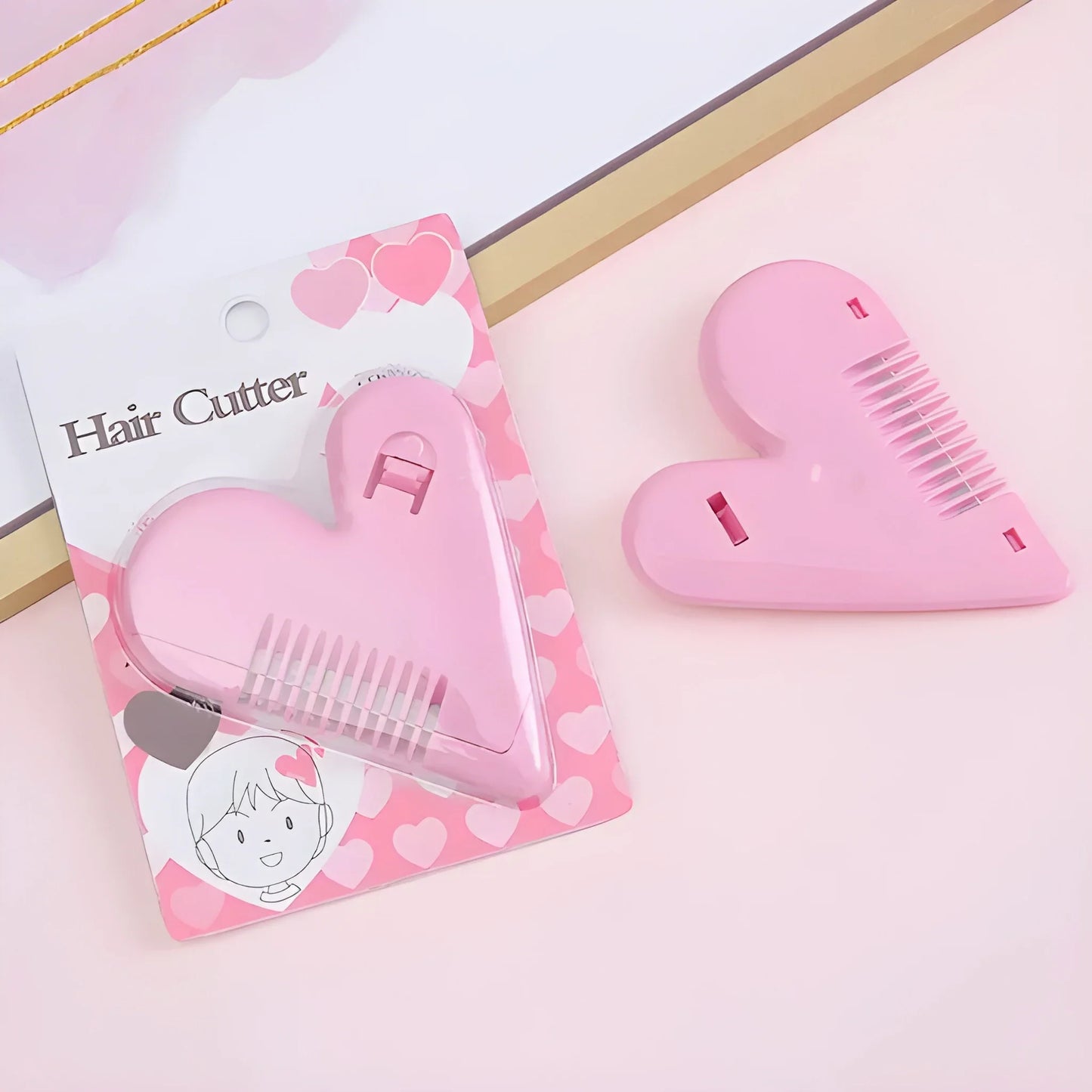 Pink hair cutting shears with comb guard and protective cover, blister pack