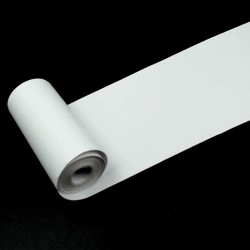 White thermal printer paper roll with empty core visible