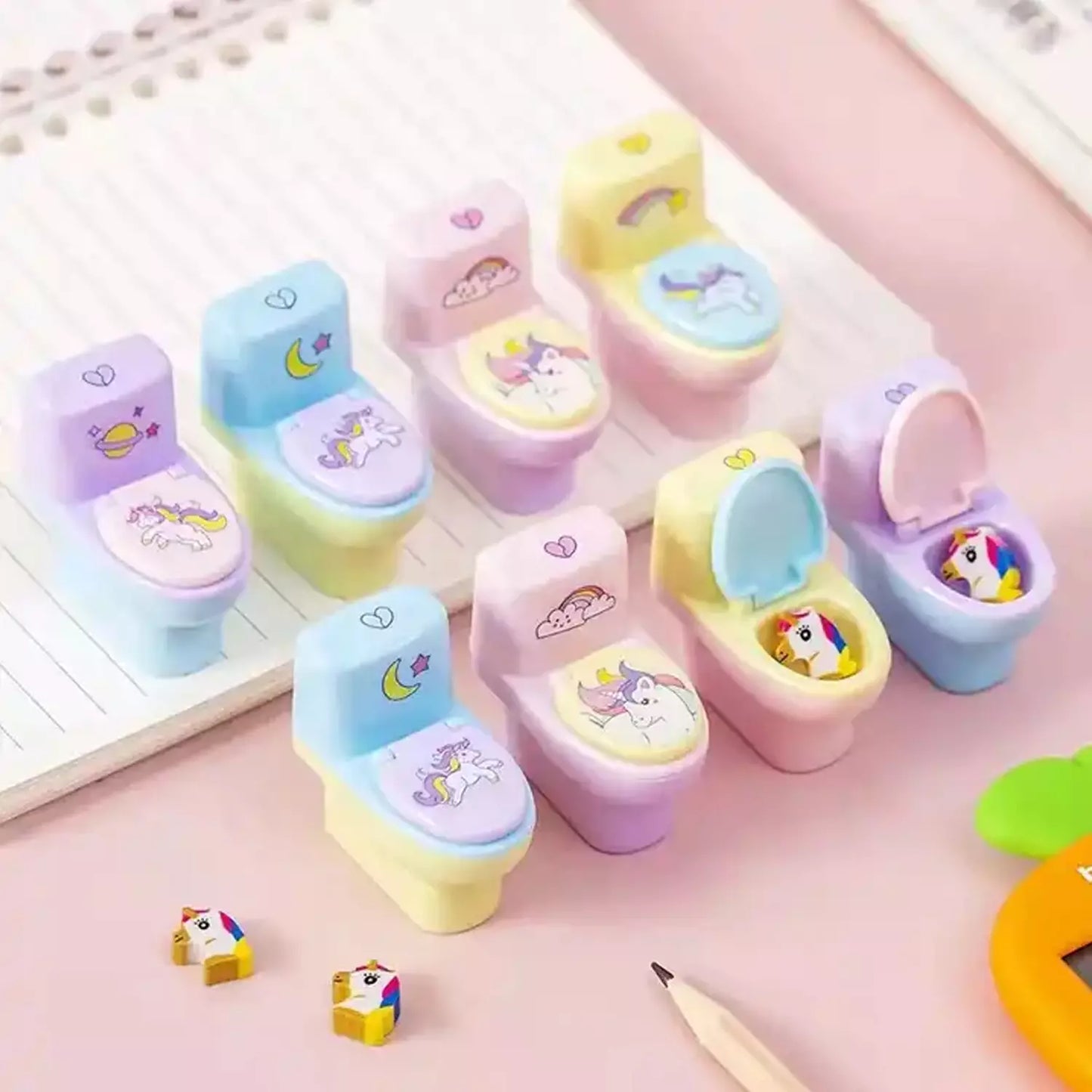 Pastel unicorn-themed pencil sharpener with colored housing and cartoon face