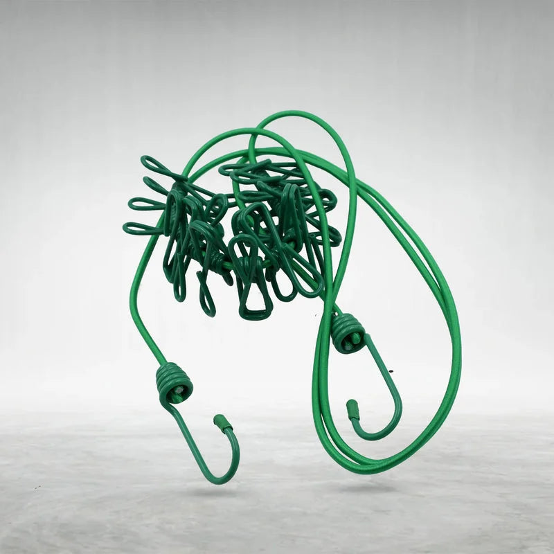 Green travel clothes drying rope with multiple clips and two S-hook ends