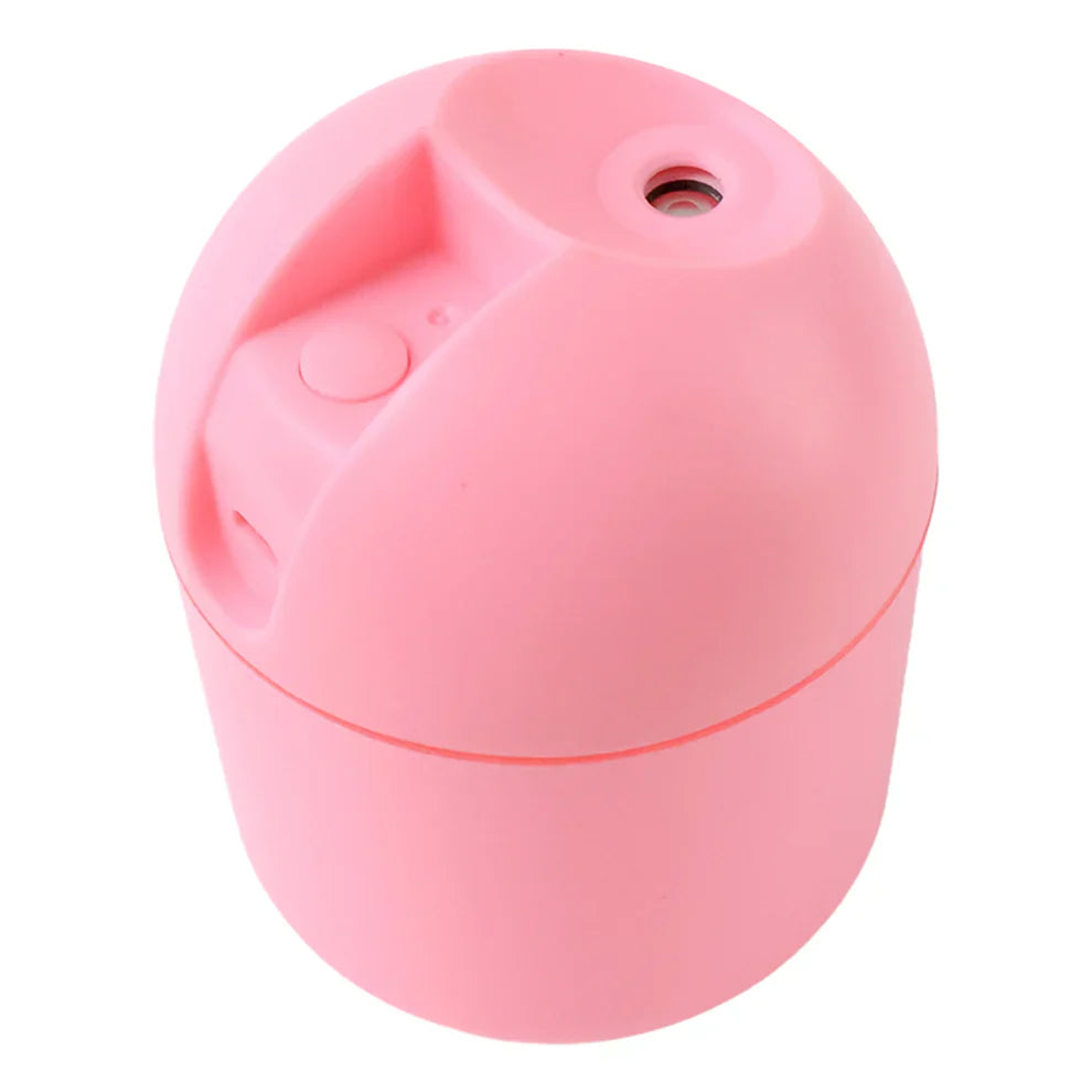 Pink mini cool mist humidifier with top opening