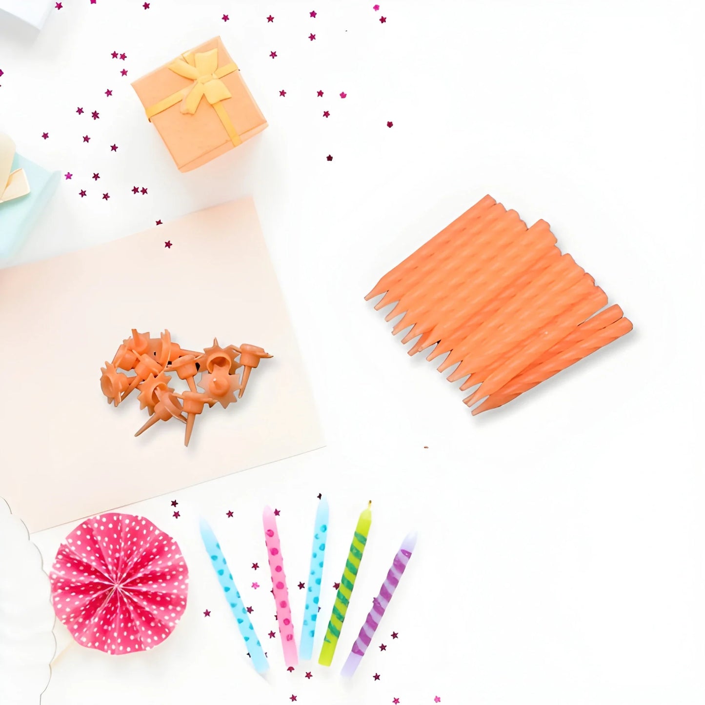 Birthday cake candle set with striped orange and star-shaped orange candles