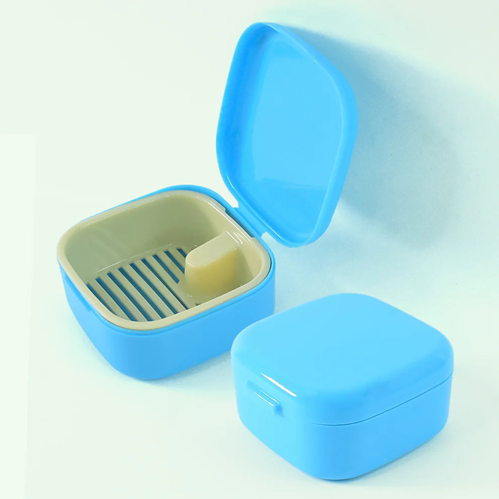 Storage box with draining tray