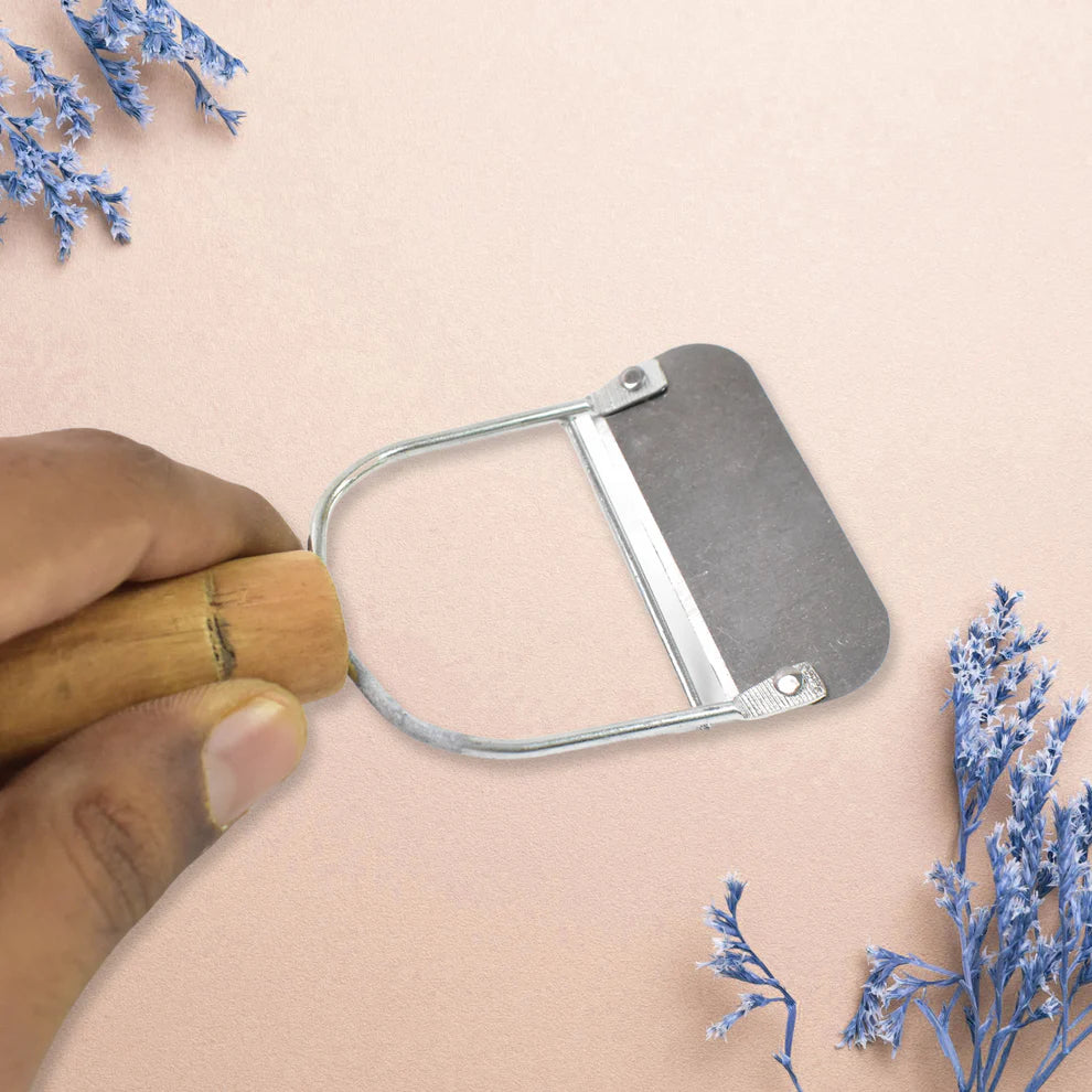 Wooden handle vegetable peeler