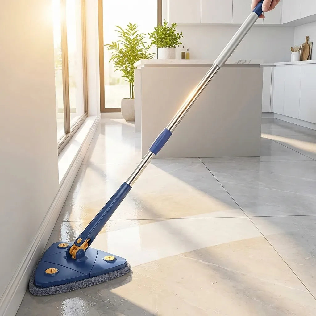 Blue extendable triangle mop on white tile floor with long extendable handle