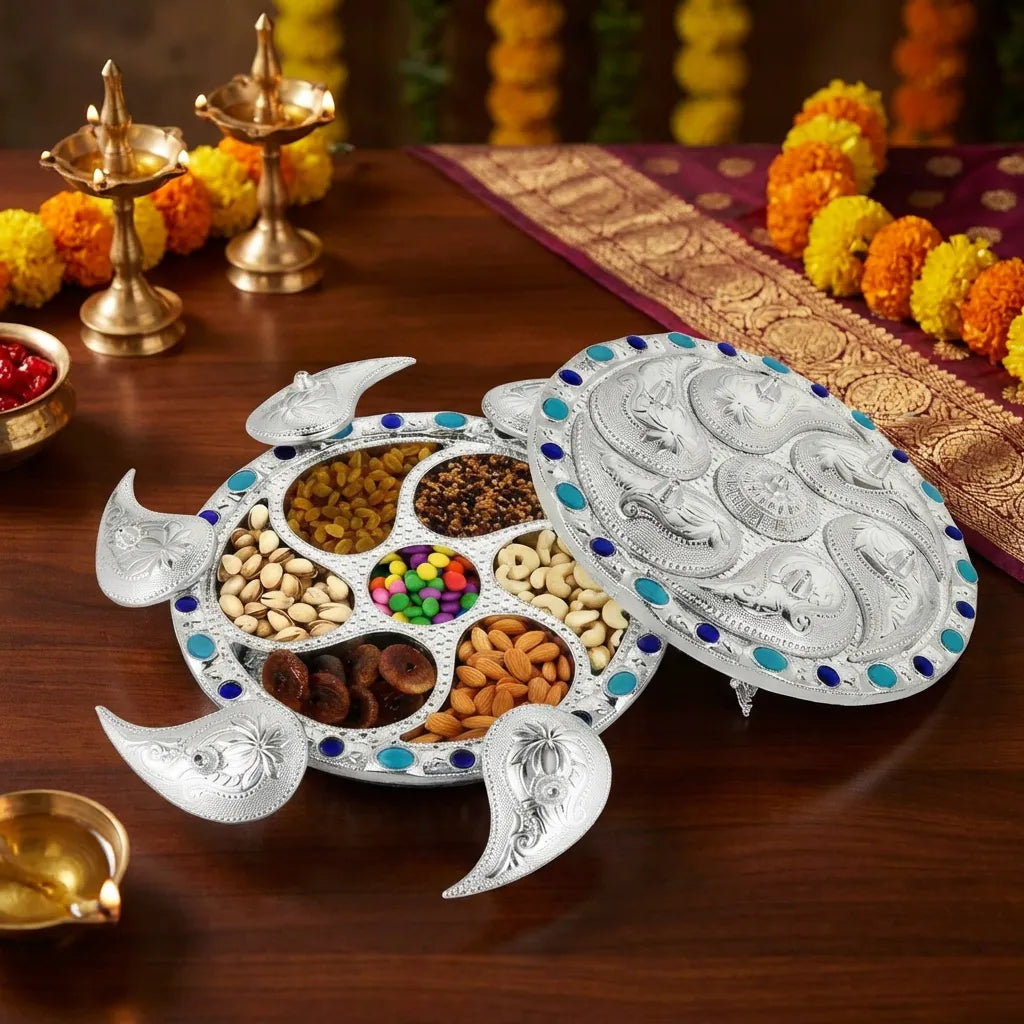 Ornate white-silver 7-compartment dry fruit tray with open lid and blue oval trim