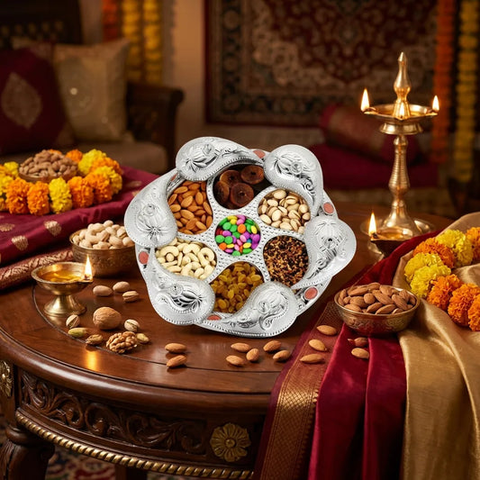 Silver 7-compartment dry fruit serving tray with curved lid and blue stud accents