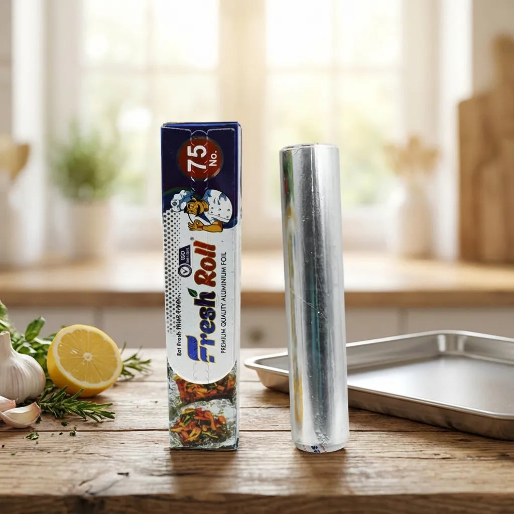 Heavy duty aluminum foil roll beside foil package on a table
