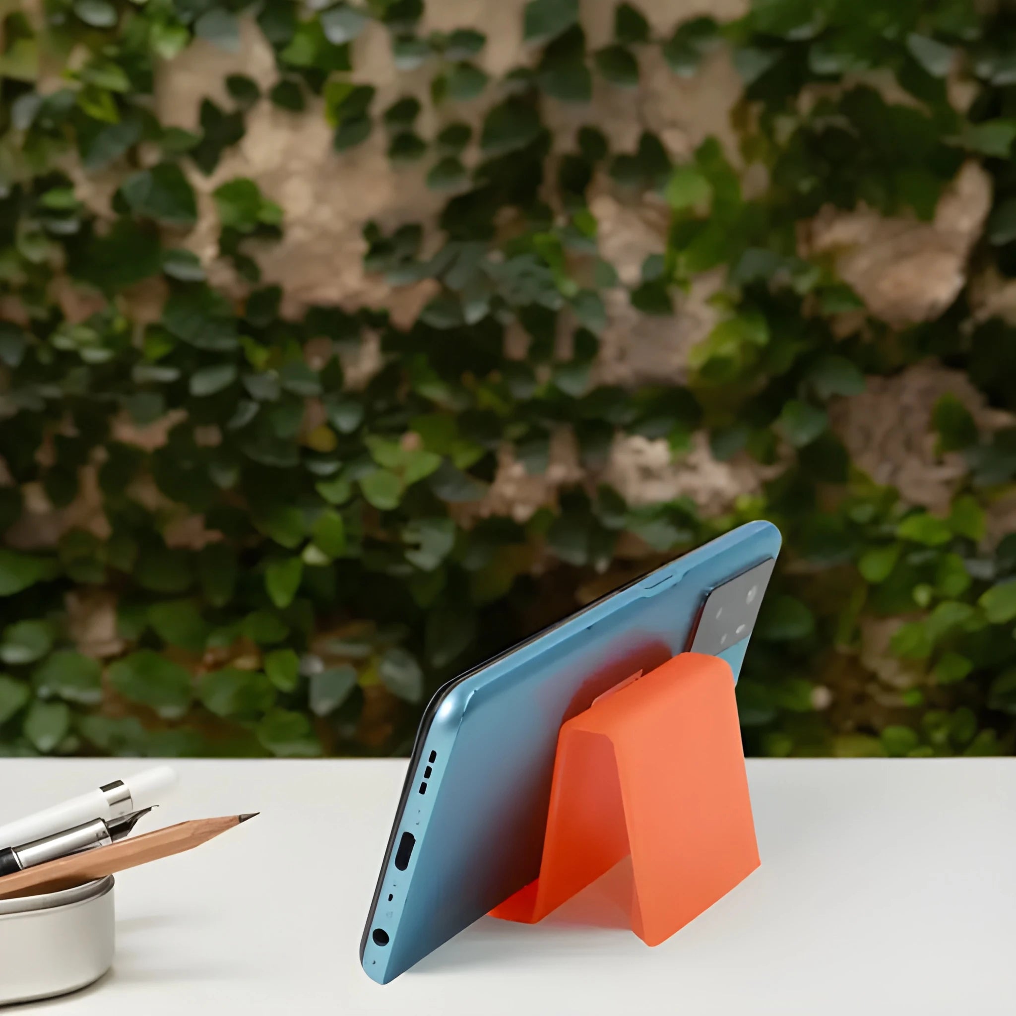 Angled phone stand holder