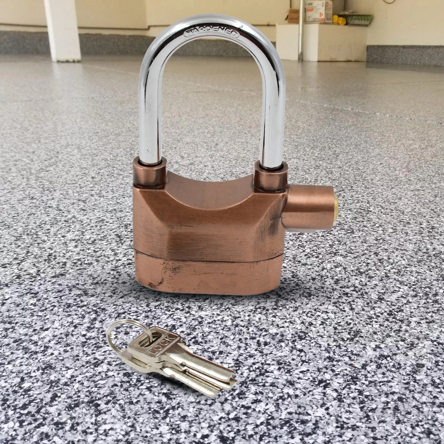 Security padlock with alarm