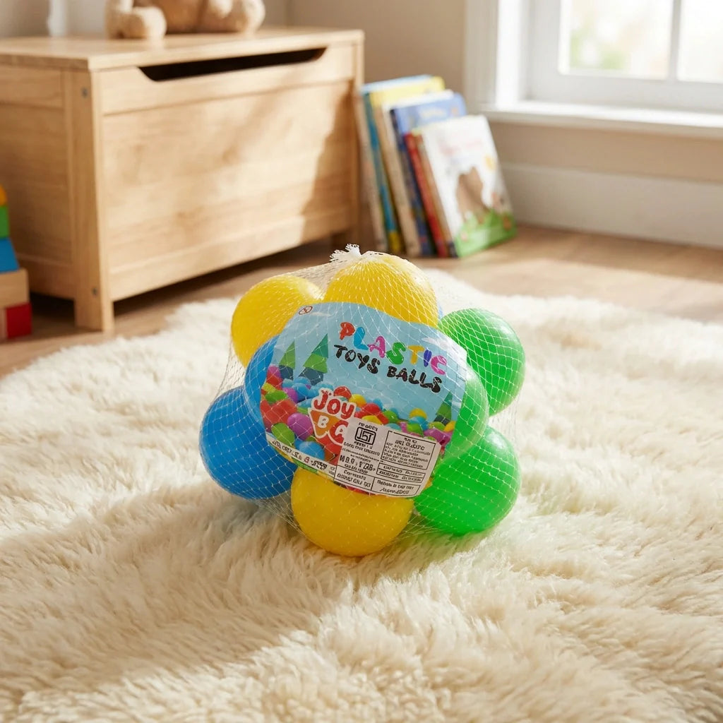Baby multicolor play balls in mesh ball, bright yellow blue green, toy label visible