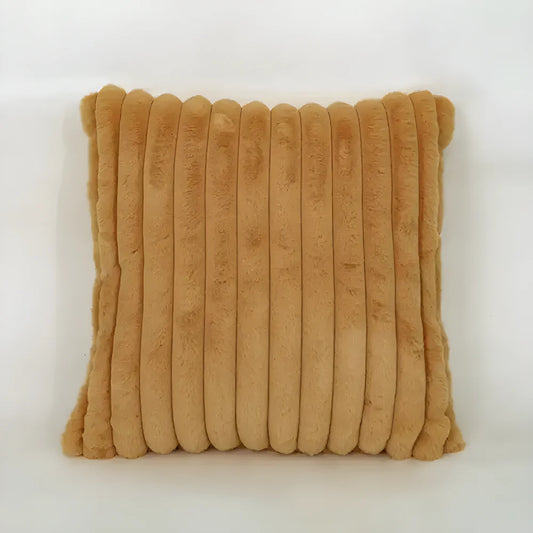 Corduroy pillow cover in tan with vertical ribbed texture, square shape.