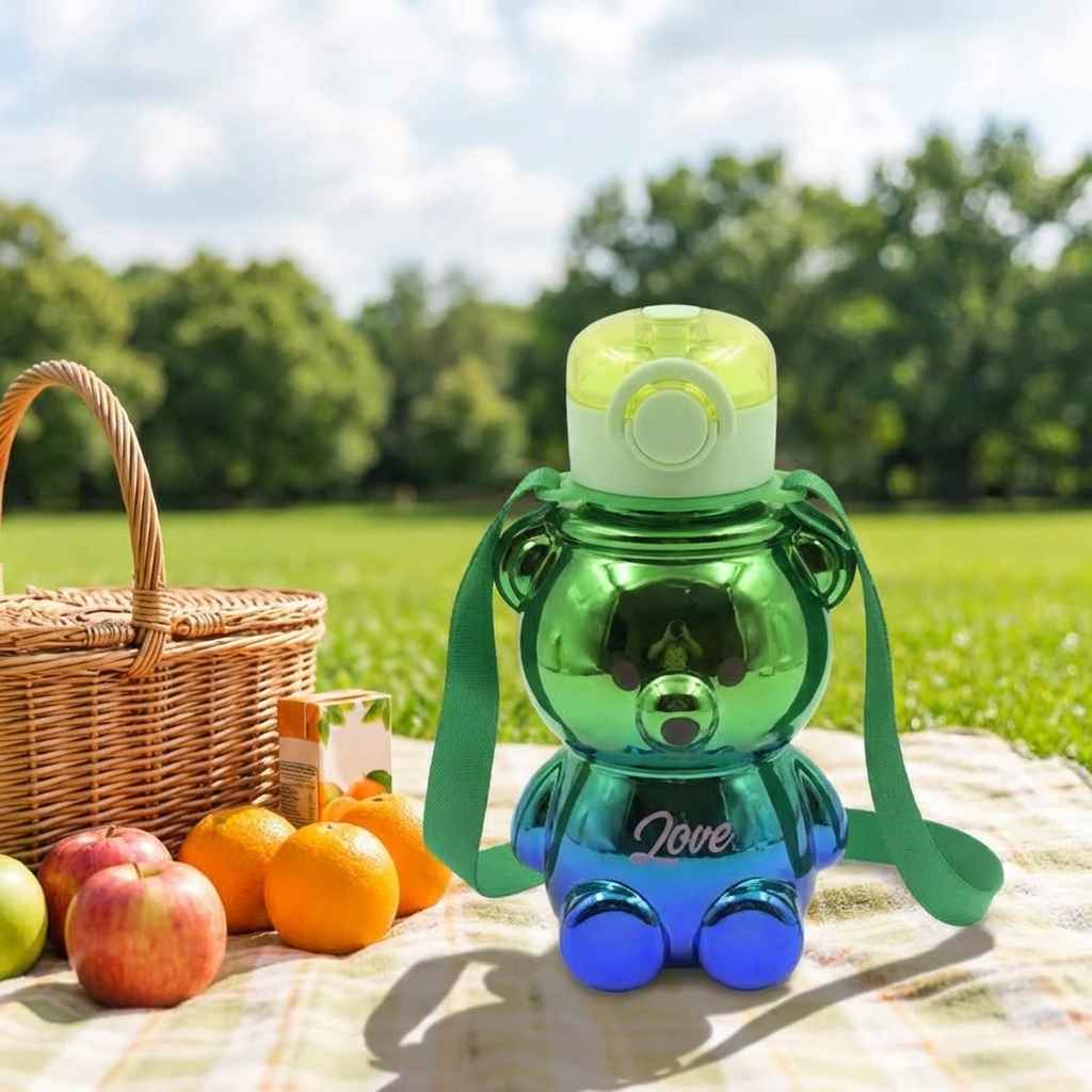 Kids green straw water bottle with carry strap and flip straw lid, rounded bear shape