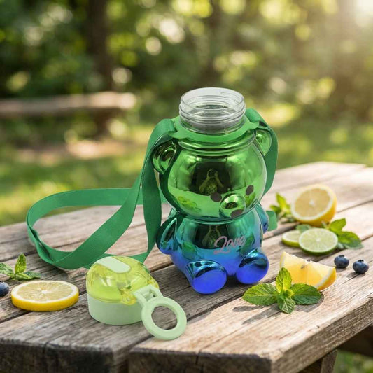 Kids green straw water bottle with carry strap and blue foot base, bear-shaped