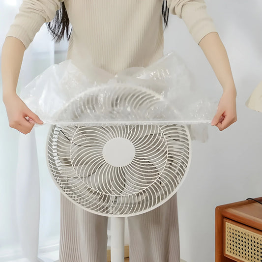 Elastic dust shield cover for a box fan, held over the fan grille with clear plastic