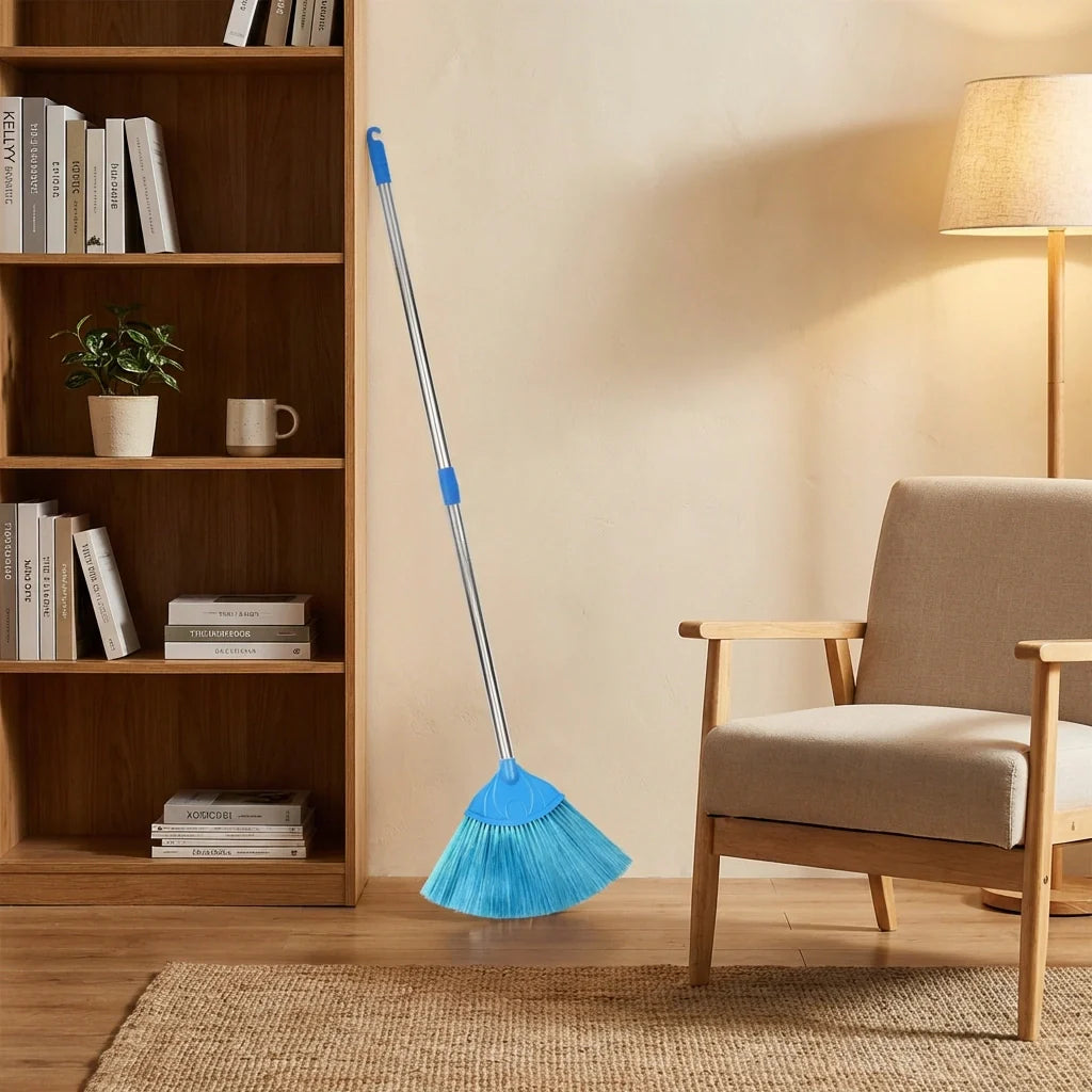 Extendable broom stick with blue brush head and silver telescoping handle