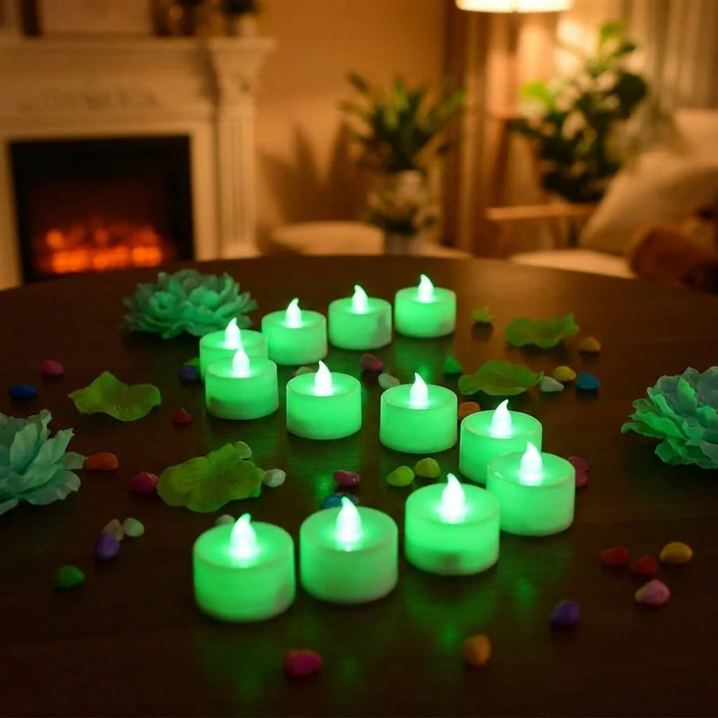 Green flameless LED tealight candles, glowing in round holders.