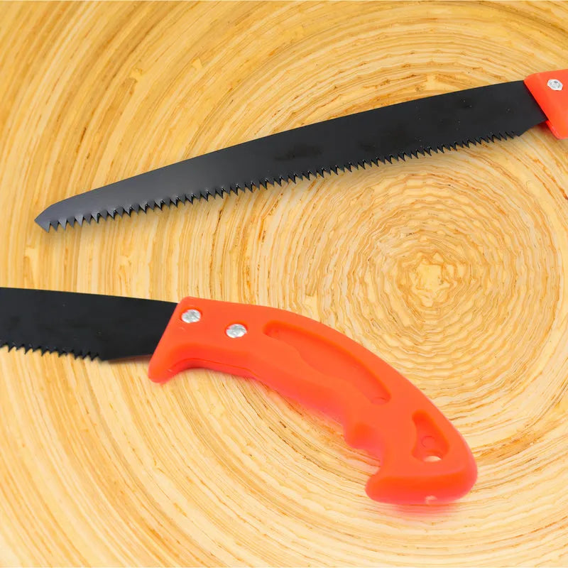 Hand pruning saw showing black serrated blade and orange ergonomic handle