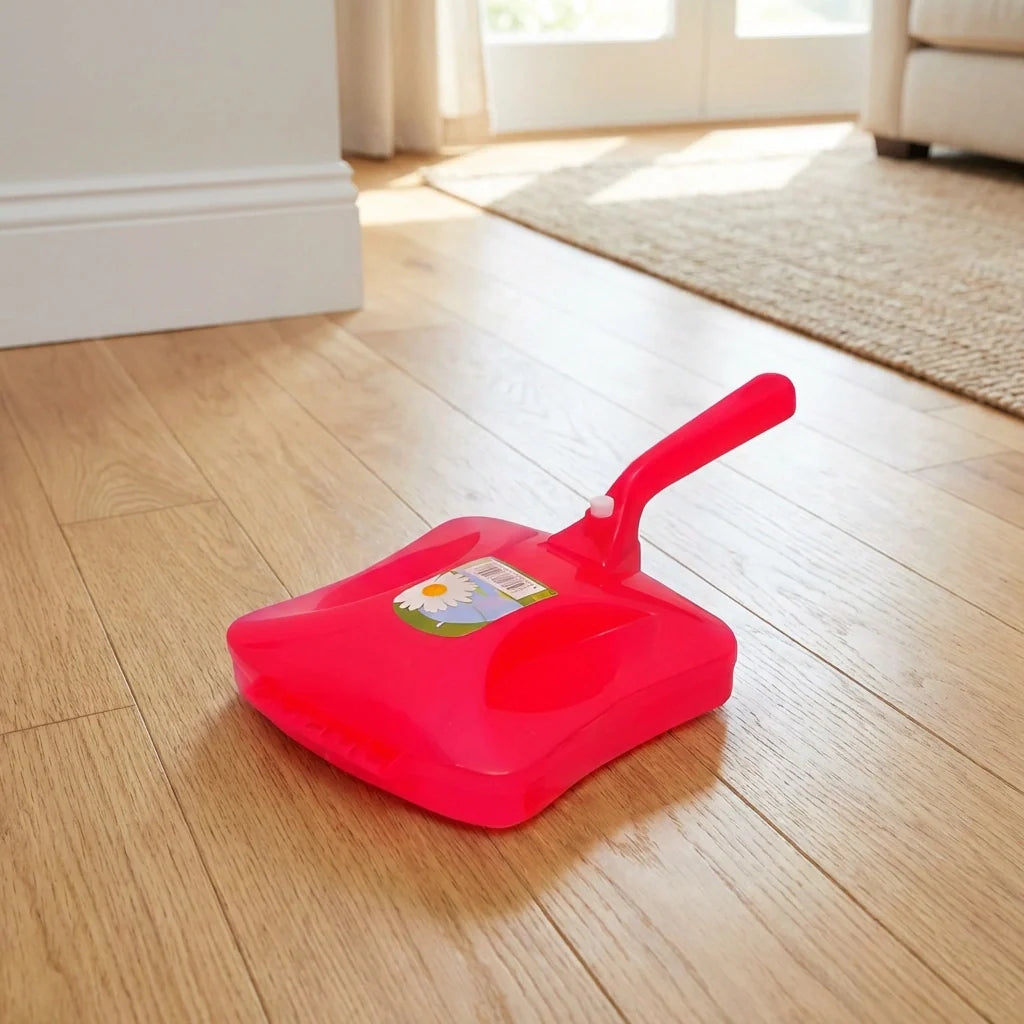 Red handheld carpet crumb cleaner with flat base and carry handle