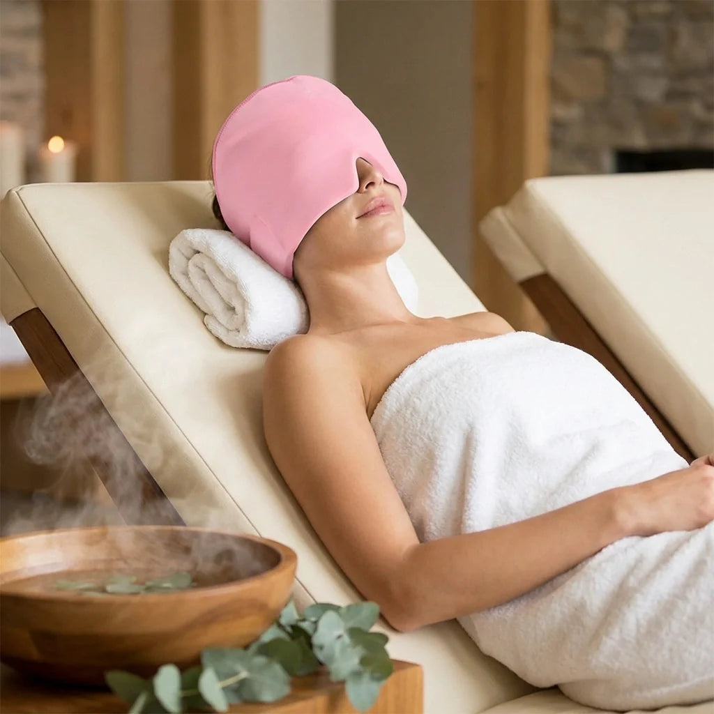 Pink ice cap resting on forehead for headache relief