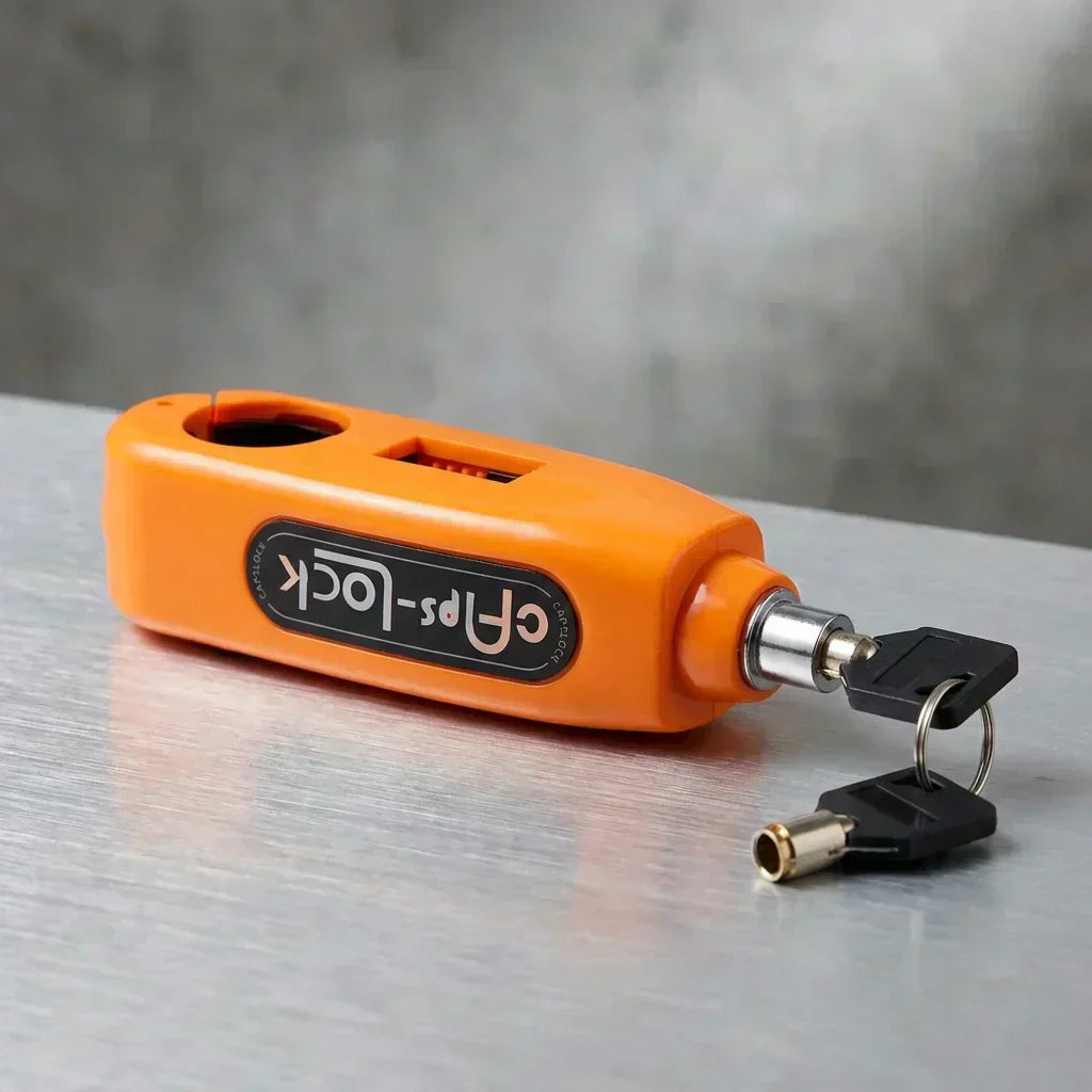 Orange bike brake lock with key and metal barrel