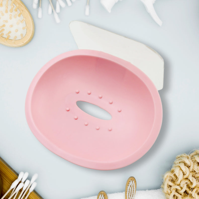 Self-adhesive soap holder