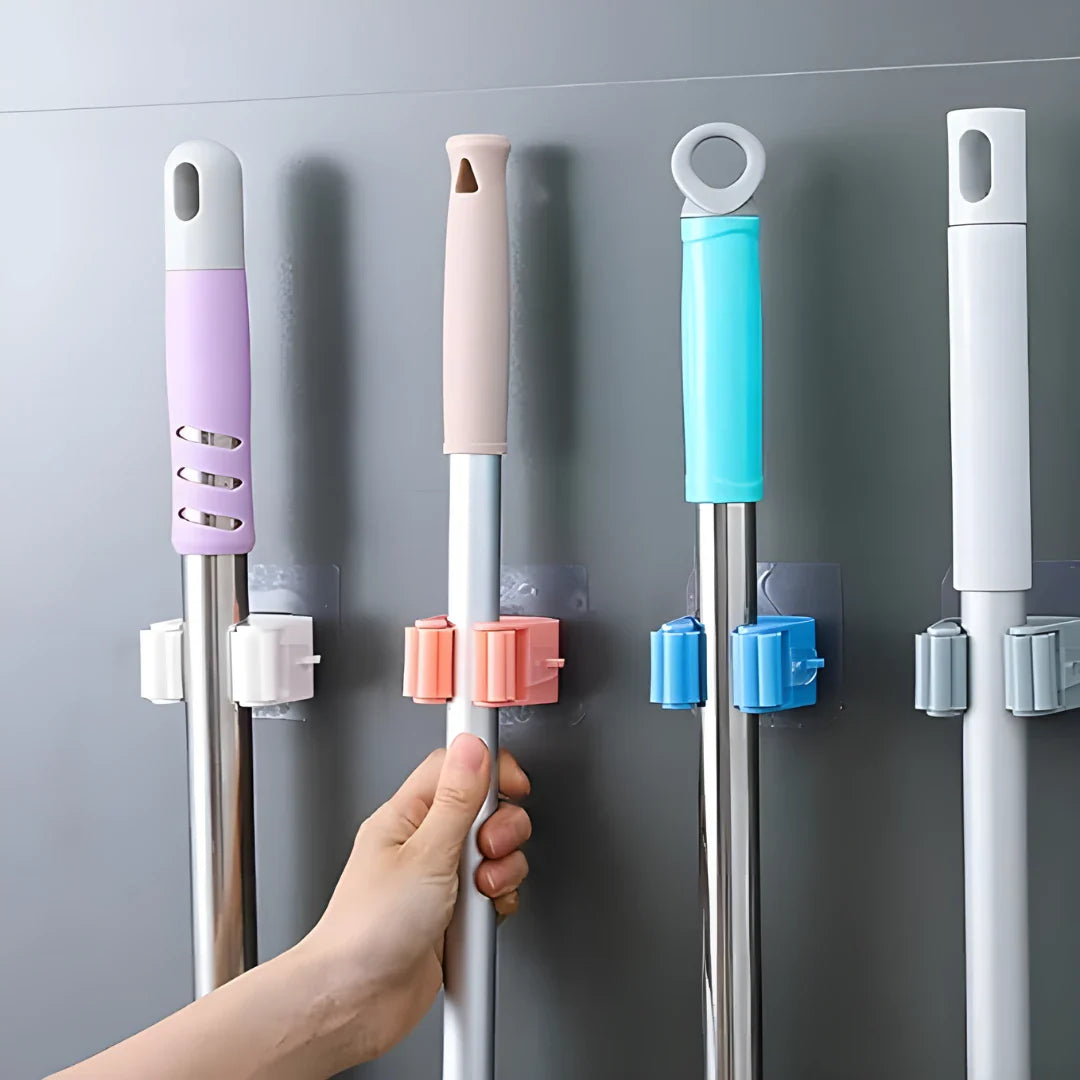 Wall-mounted mop holder with metal pole and colored hook grips