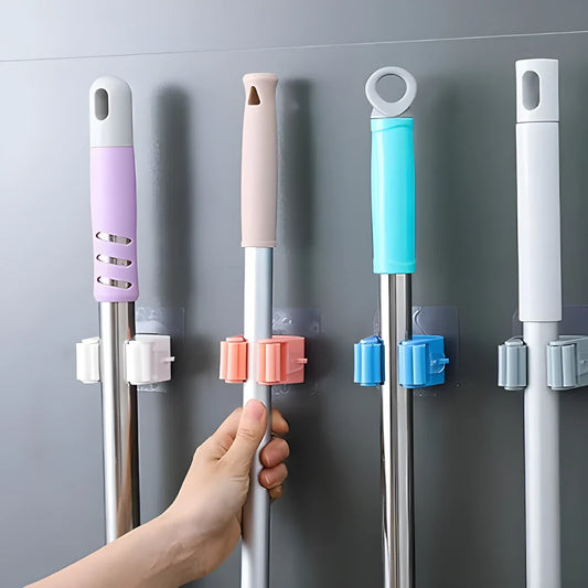 Wall-mounted mop holder with metal pole and colored hook grips