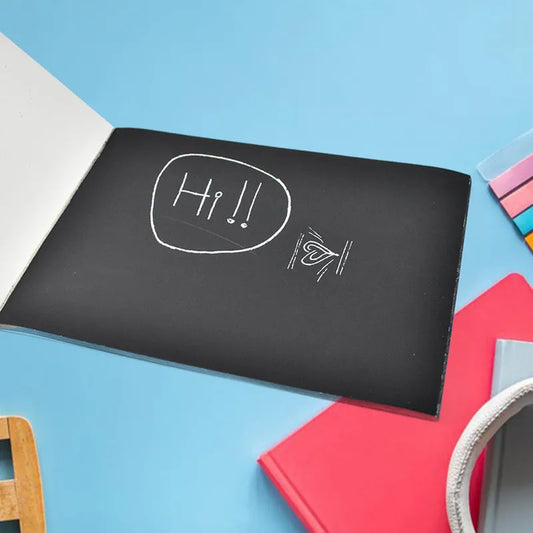 Scratch art book cover, black with white "Hi!!" doodle