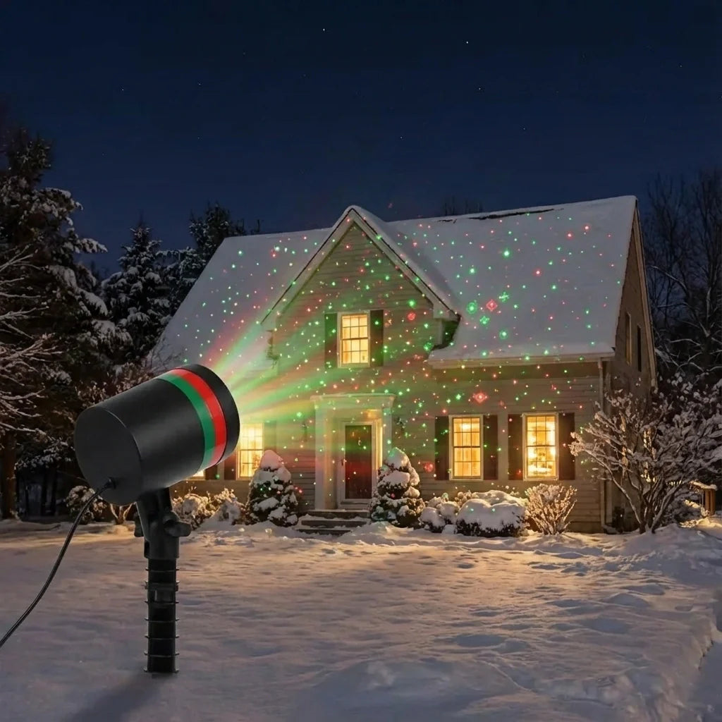 Outdoor laser light projector emitting green and red holiday light patterns