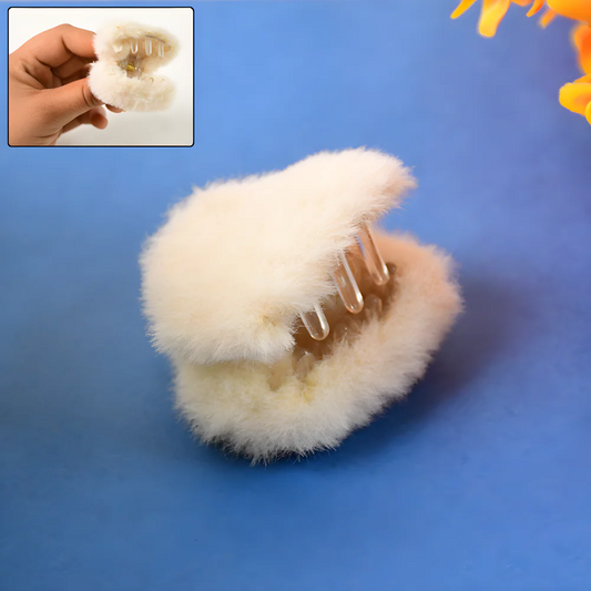 Cream plush claw hair clip with clear-toned teeth