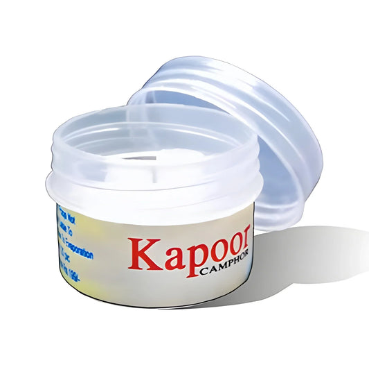 Camphor Kapoor tablets tub with open lid, red and blue label text