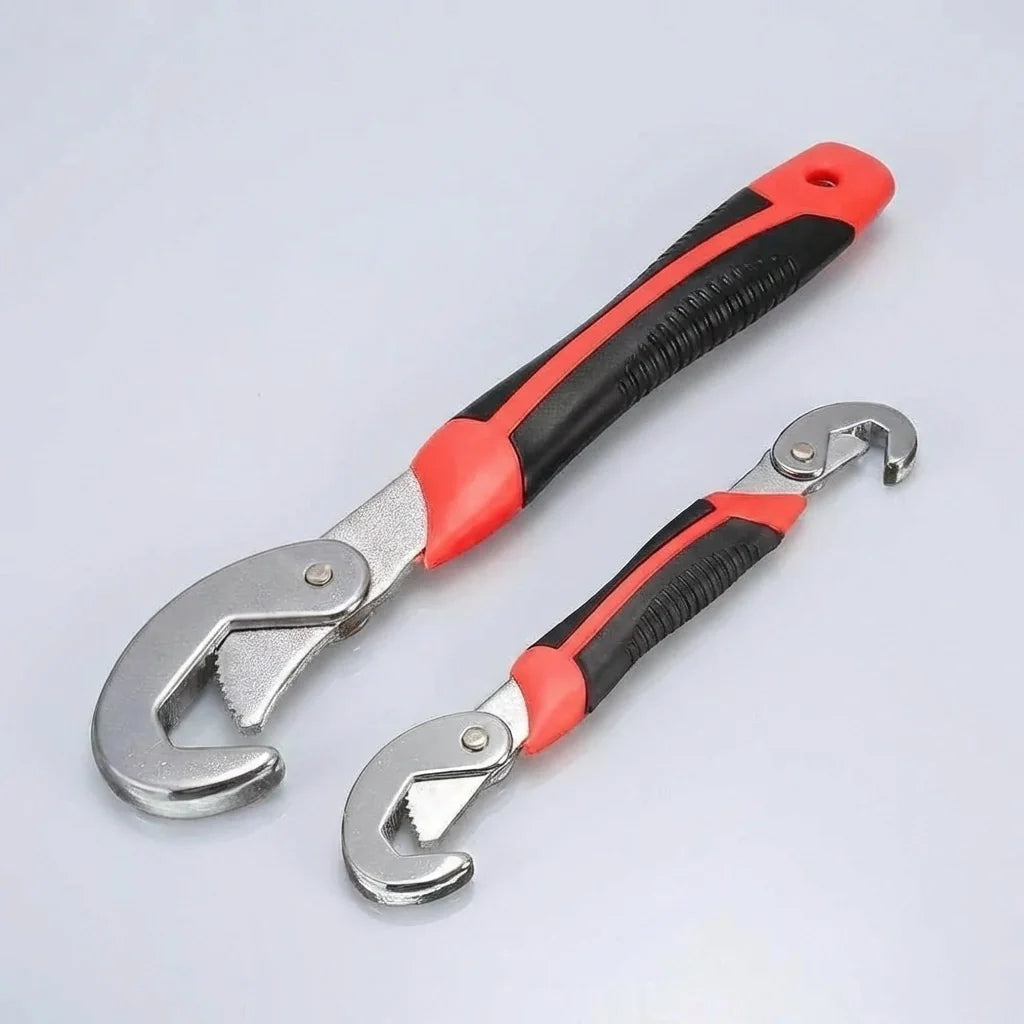 Two red-and-black adjustable wrenches with quick-snap jaws isolated on light background.