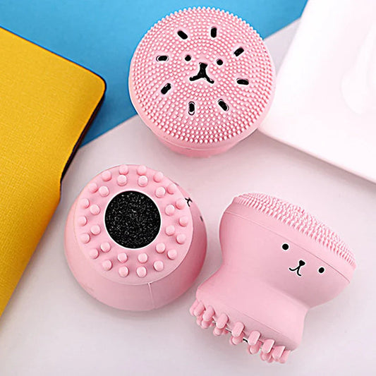 Pink silicone octopus face scrubber with raised dots and octopus face design
