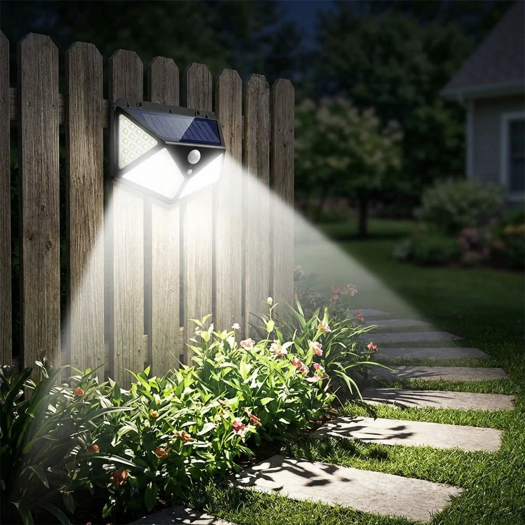 Solar wall light on wooden fence with LED beams lighting walkway