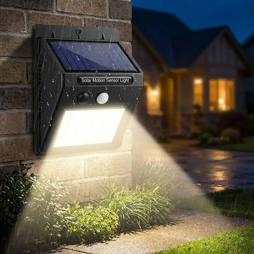 Solar motion LED wall light with textured housing, solar panel, and bright lamp