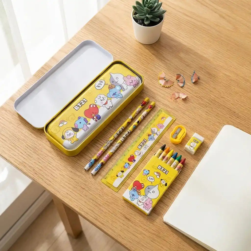 Kids stationery set with open yellow BT21 pencil case, colored pencils, and eraser