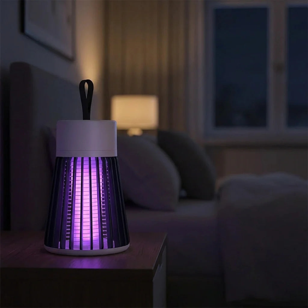 Cylindrical USB mosquito killer lamp with glowing purple light and carry handle
